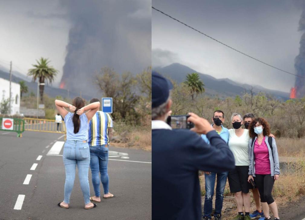 Vecinos de La Palma fotografiándose junto al volcán u observando su erupción en la distancia. M.A.