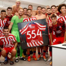 <p>La plantilla celebra el récord de Koke tras ganar al Sevilla por 0-2.</p>