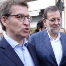 <p>Alberto Núñez Feijóo y Mariano Rajoy paseando por la ciudad de Vigo en diciembre de 2015. </p>