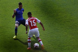 <p>Yannick Carrasco, del Monaco y Chamberlain, del Arsenal, durante un partido de la Copa Emirates, durante el 2014.</p>