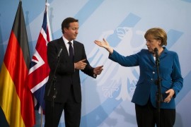 <p>David Cameron y Angela Merkel en una reunión en la Unión Europea.</p>