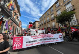<p>Cabecera de la manifestación en apoyo a las sindicalistas de la pastelería Suiza de Gijón convocada por la CNT en Madrid.</p>