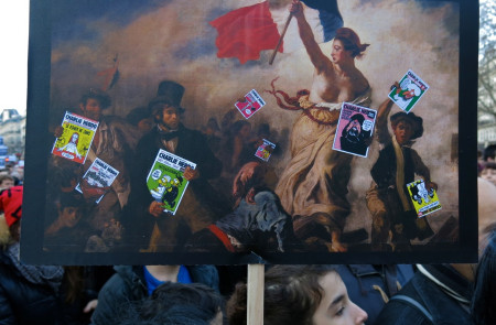 La libertad guiaba a los lectores de Charlie en una pancarta en la manifestación del pasado día 10.