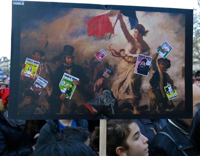 La libertad guiaba a los lectores de Charlie en una pancarta en la manifestación del pasado día 10.