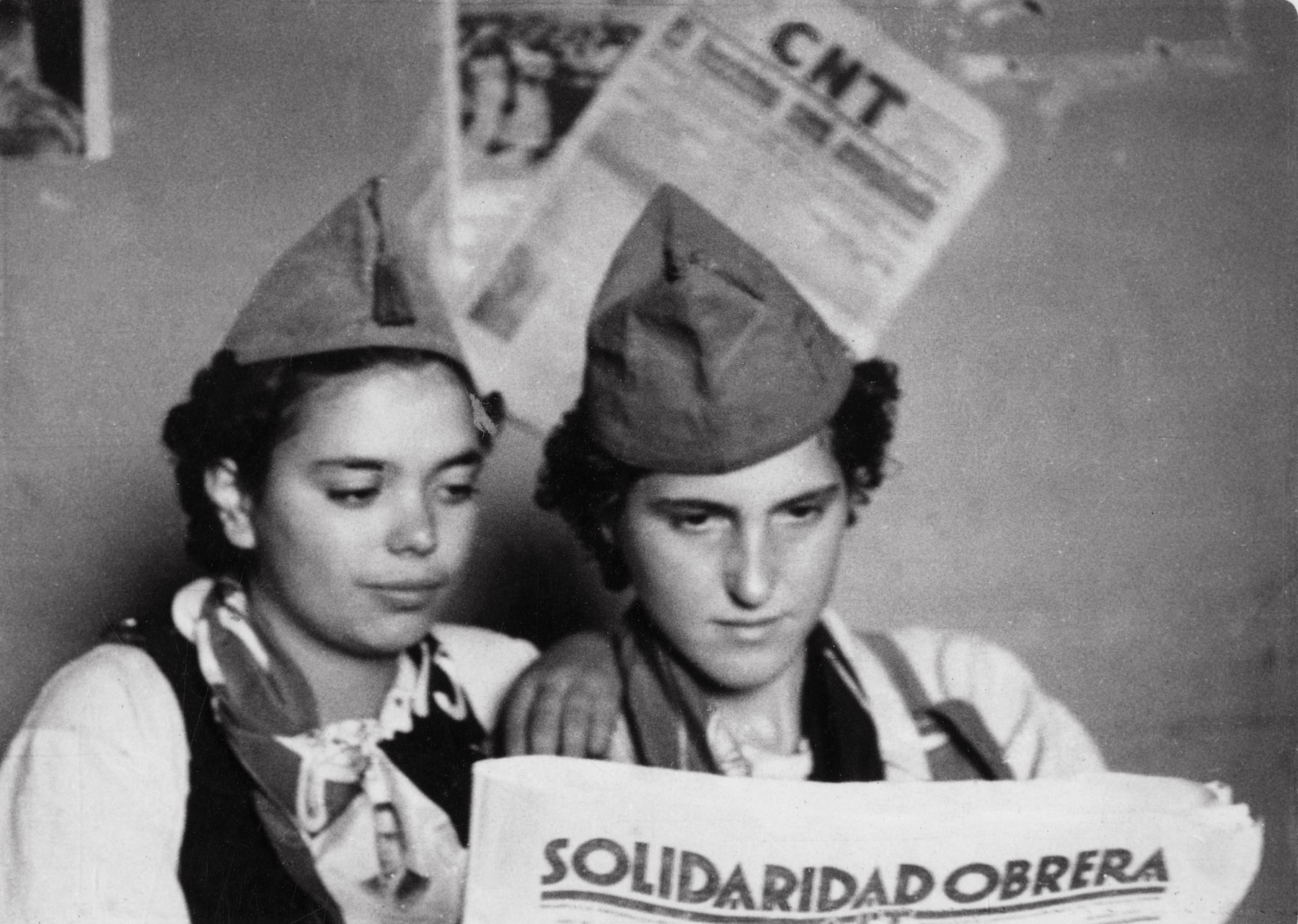 <p>Milicianos de la CNT leyendo el periódico Solidaridad obrera. 1936-1939. International Institute of Social History.</p>